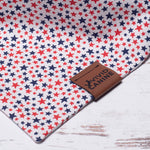 white dog bandana with red and blue stars