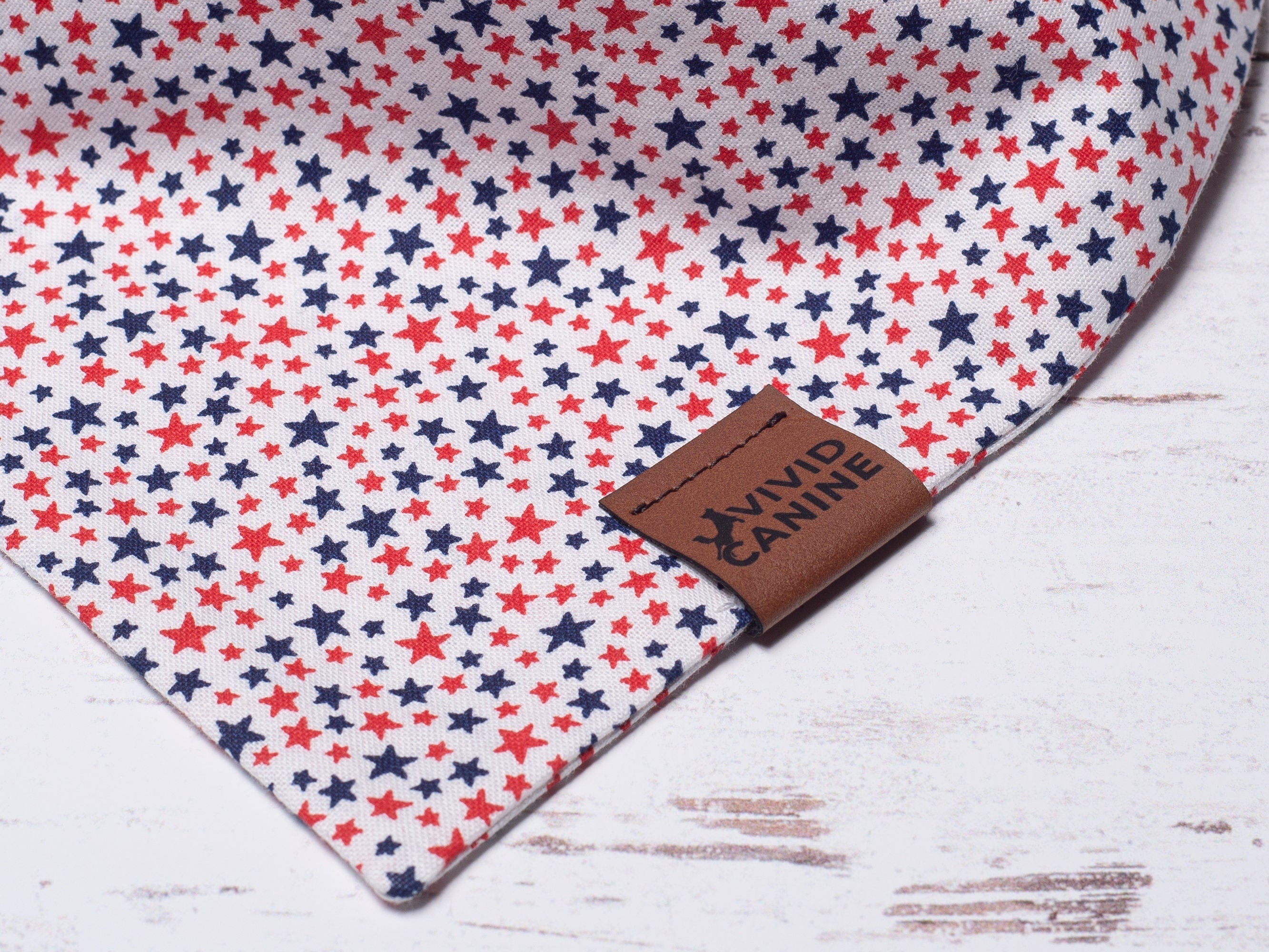 white dog bandana with red and blue stars