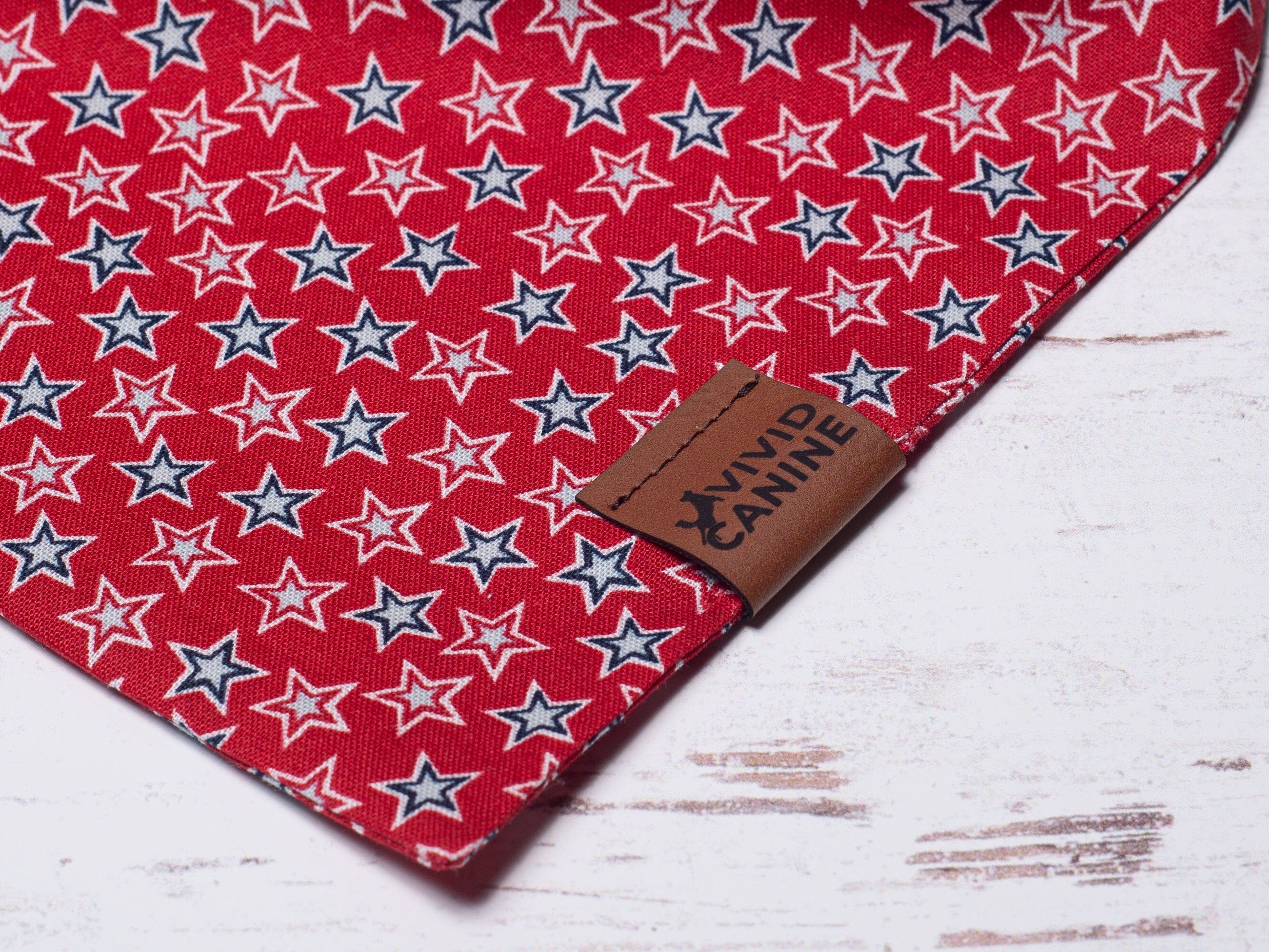 red dog bandana with white stars outlined in red and blue